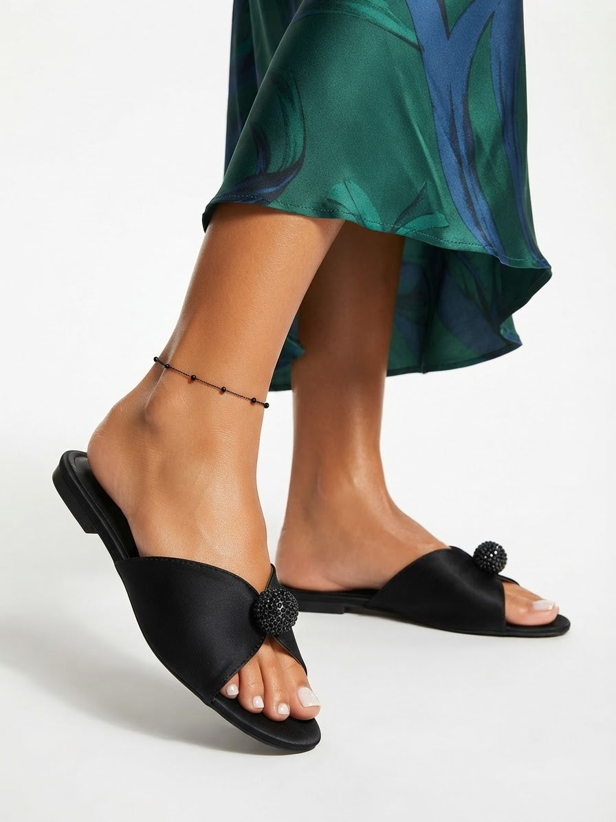 Leather slippers with crystal ball