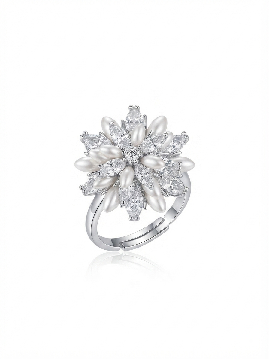 A ring set with zircon stones and pearls.