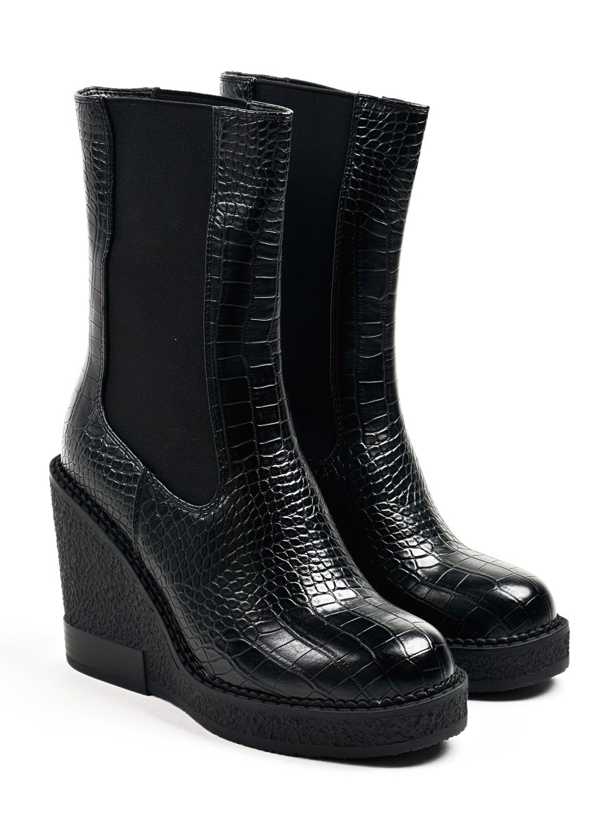 Mid-calf glossy leather boots
