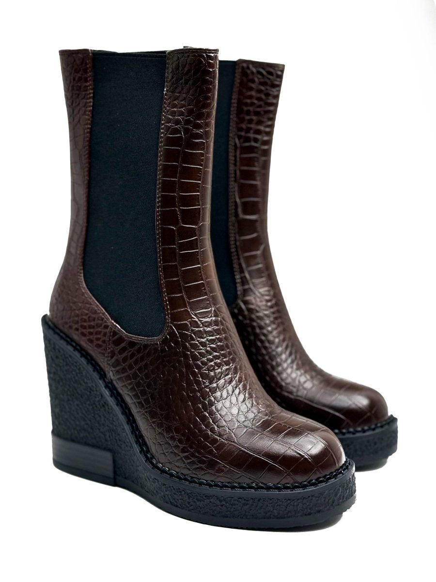 Mid-calf glossy leather boots