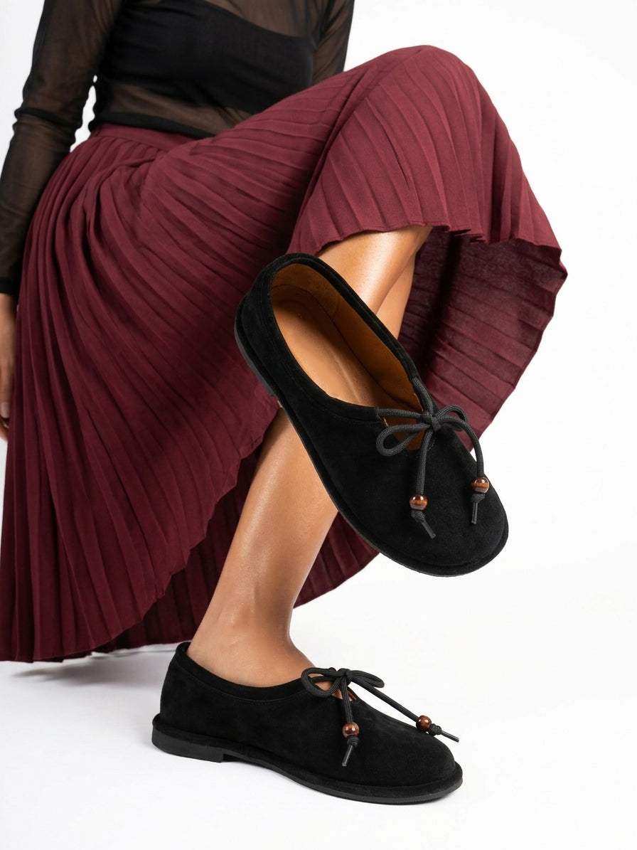 Black suede ballet flats