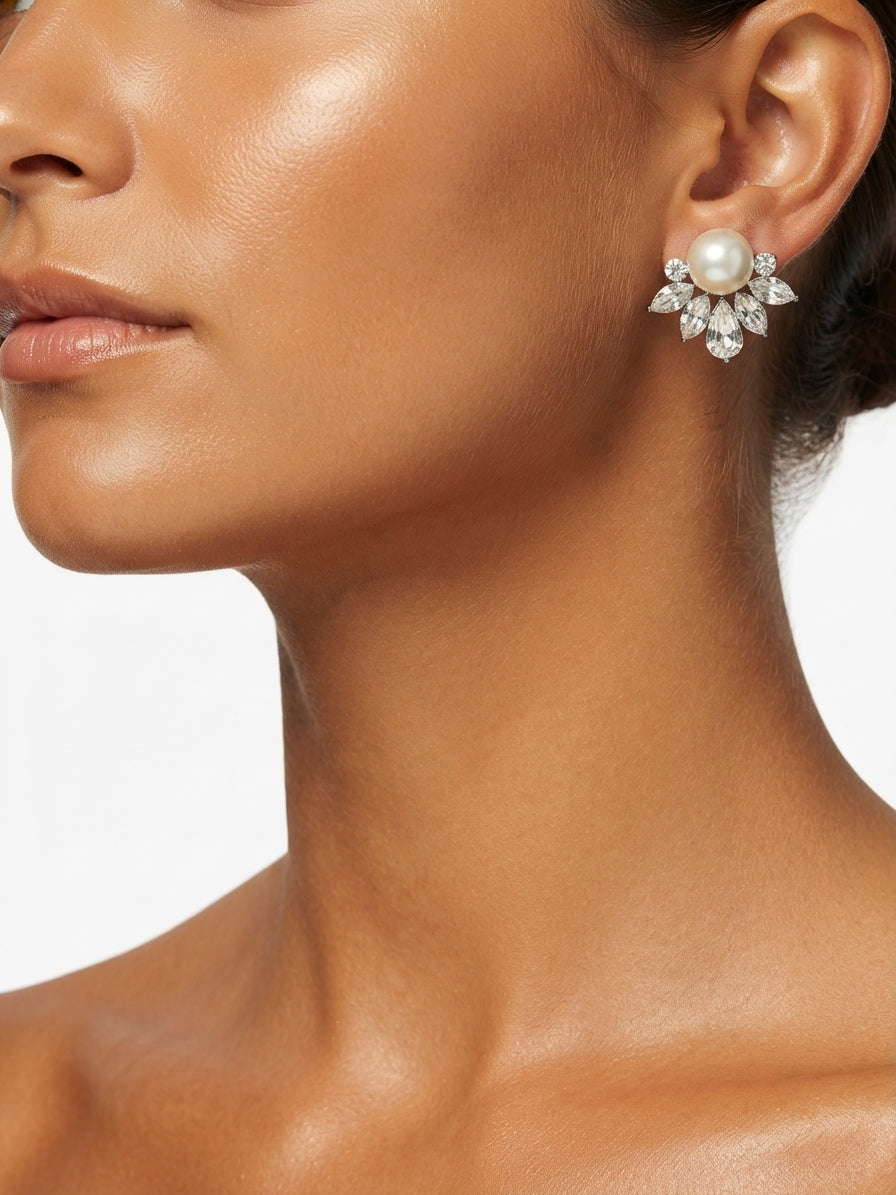 Earrings set with zircon stones and pearls