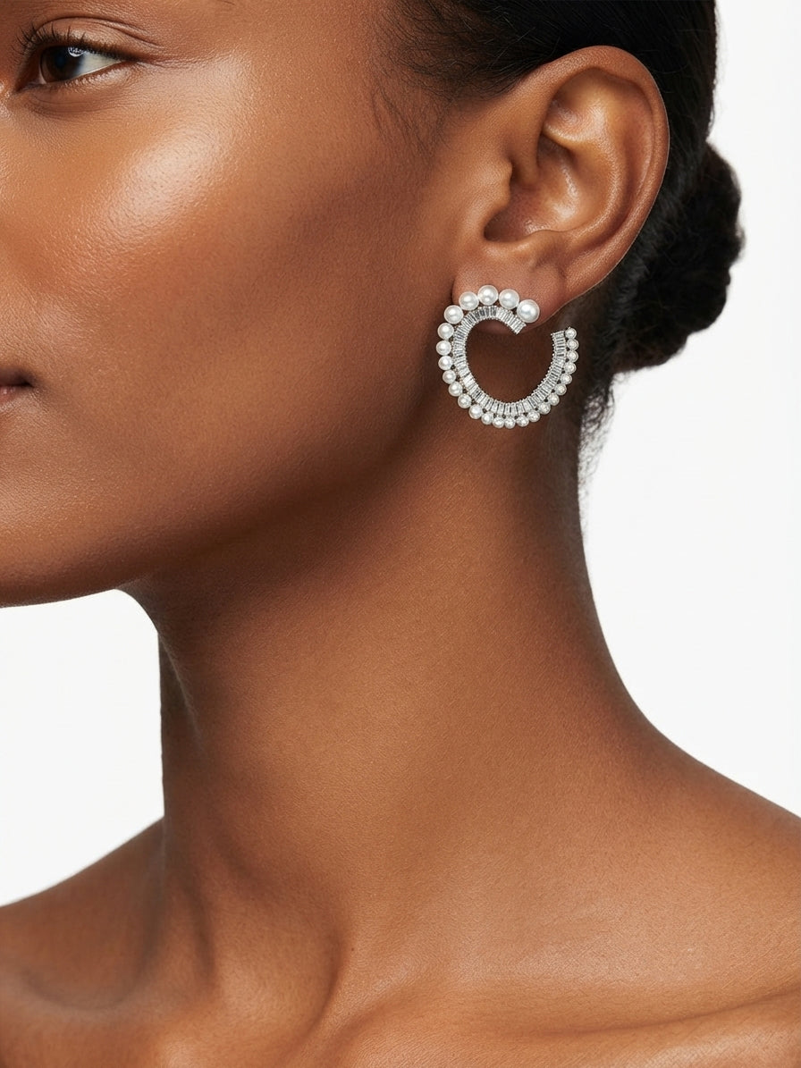 Earrings set with zircon stones and pearls