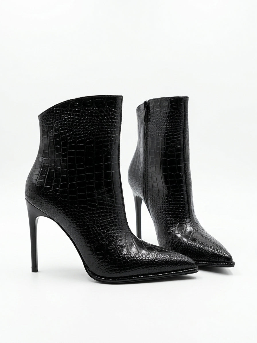 Women’s brown leather boots  Women’s black leather boots with a slim heel