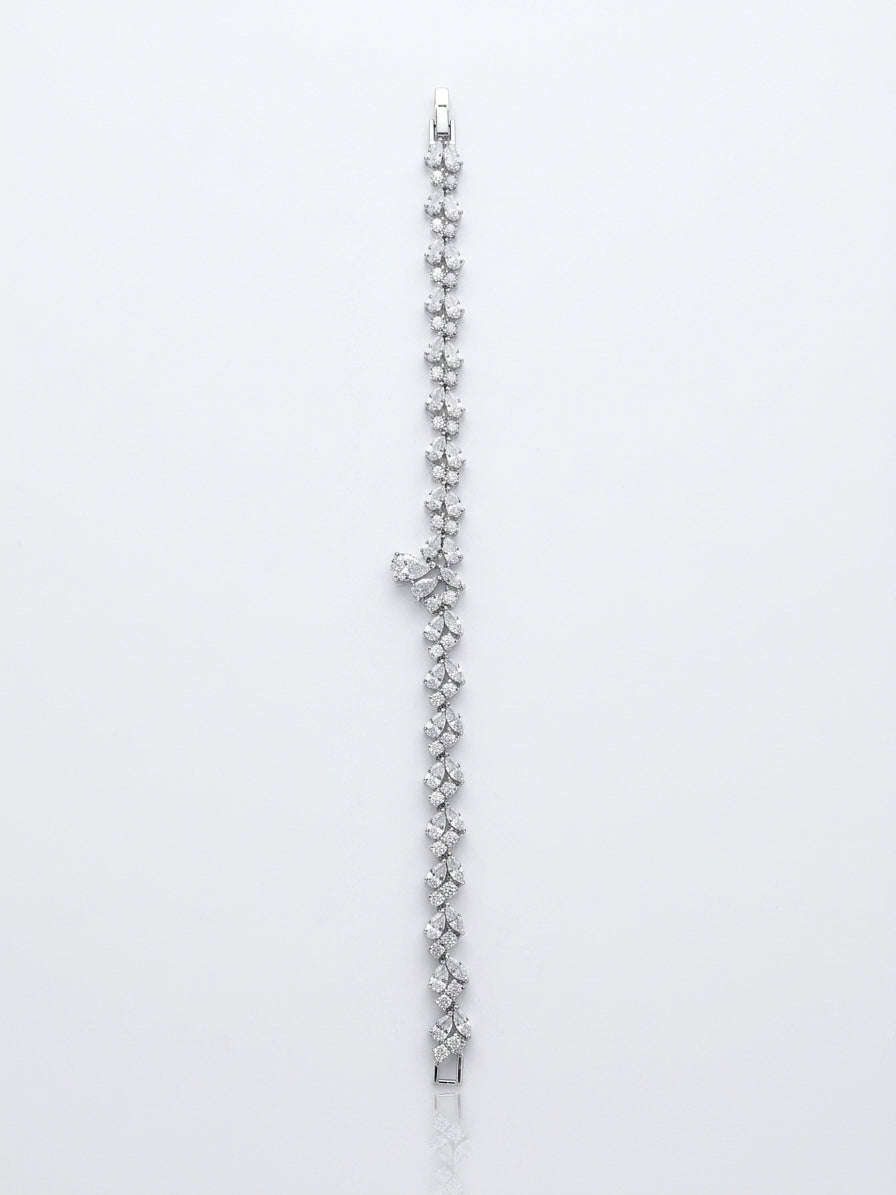 A set studded with zircon stones in silver