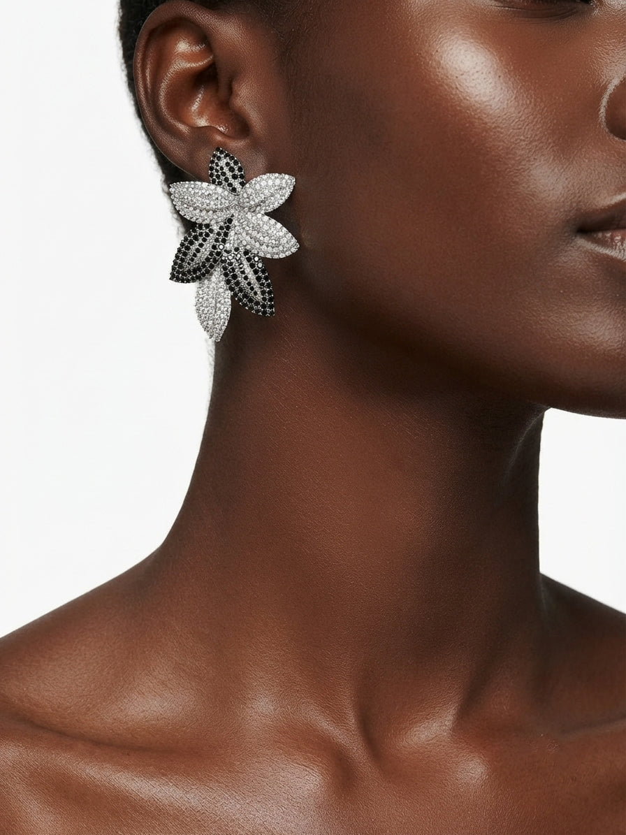 Rose-shaped earrings set with zircon stones