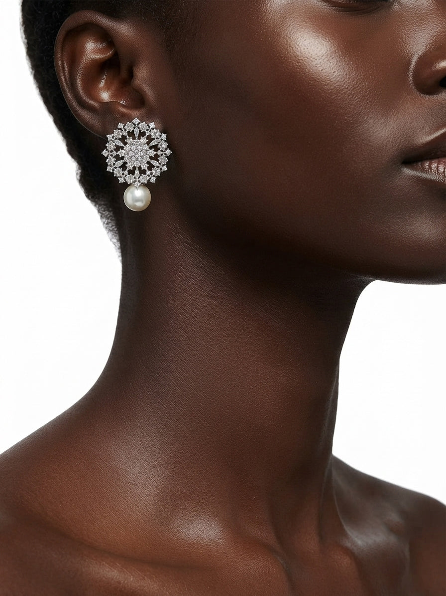 Earrings set with zircon stones and pearls