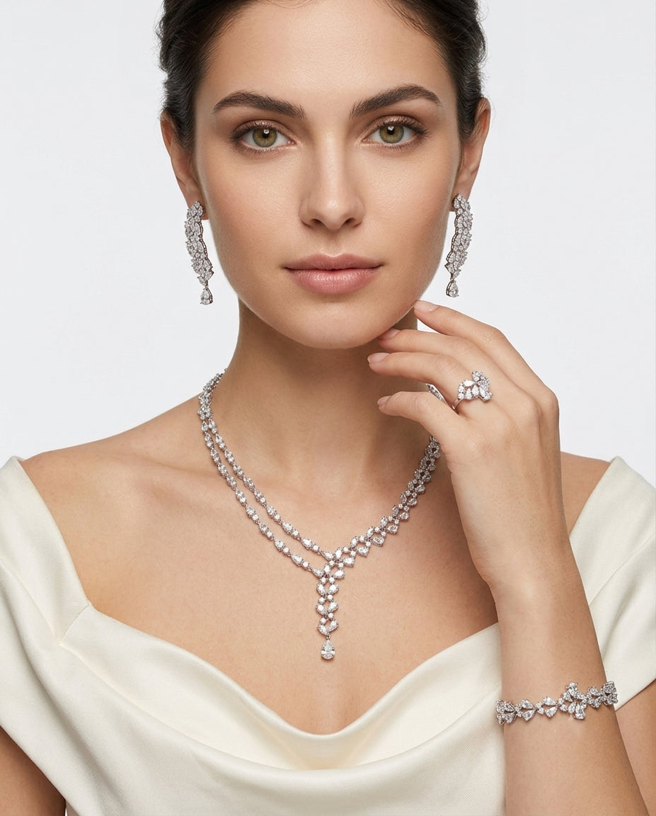 A set studded with zircon stones in silver