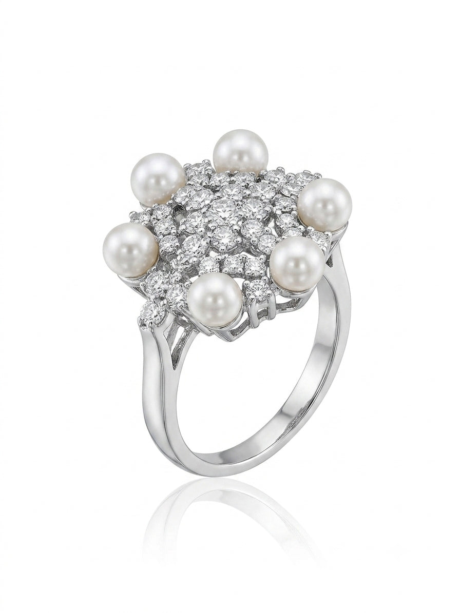 A set studded with zircon stones and pearls in silver