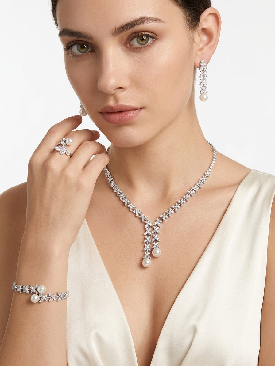 A set studded with pearls and silver zircon stones