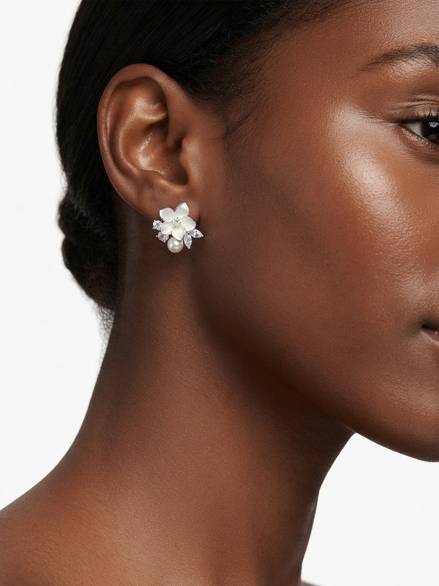 Earrings set with zircon stones and pearls