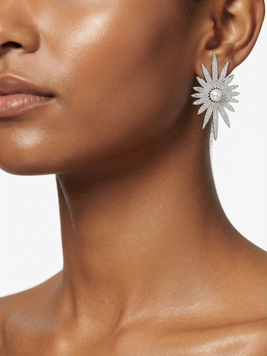 Earrings set with zircon stones and pearls