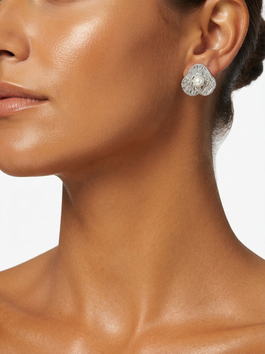 Earrings set with zircon and pearls