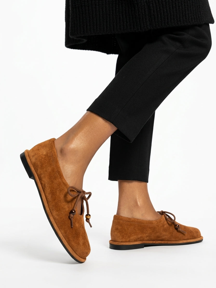 Black suede ballet flats