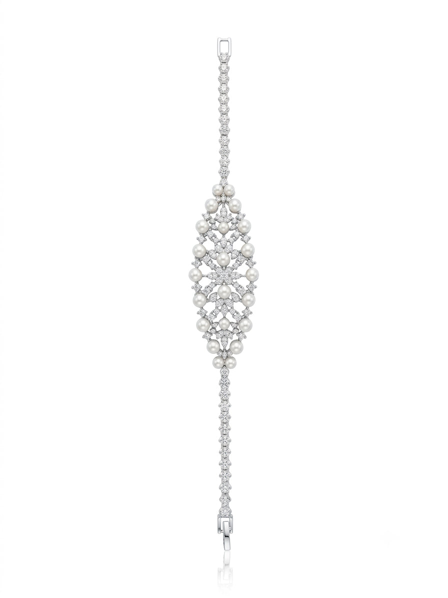 A set studded with zircon stones and pearls in silver