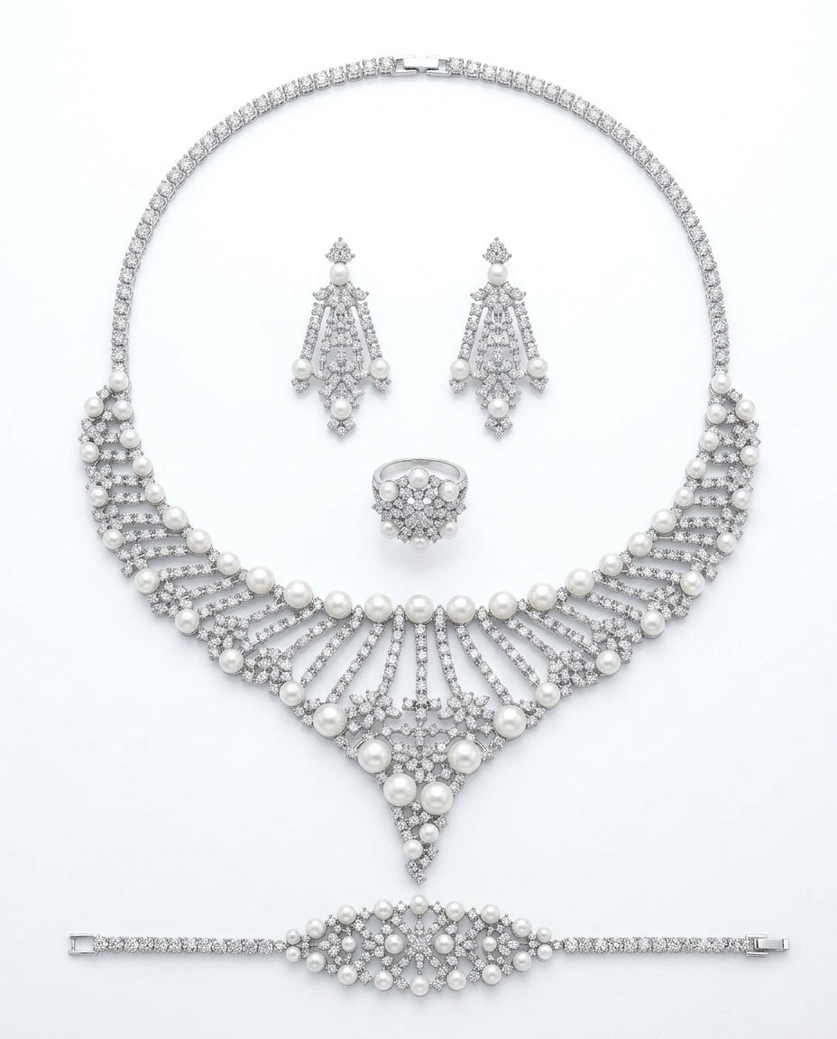 A set studded with zircon stones and pearls in silver