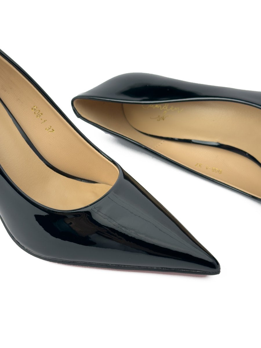 كعب من الجلد اللامع بنعل أحمر