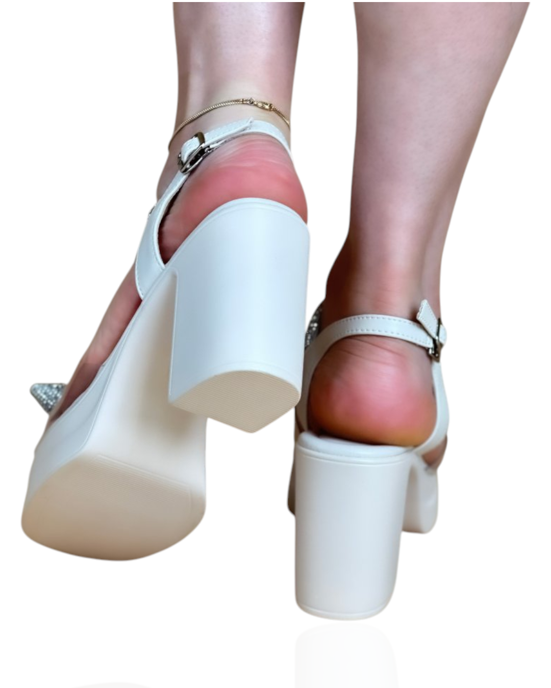 Transparent sandal studded with stones