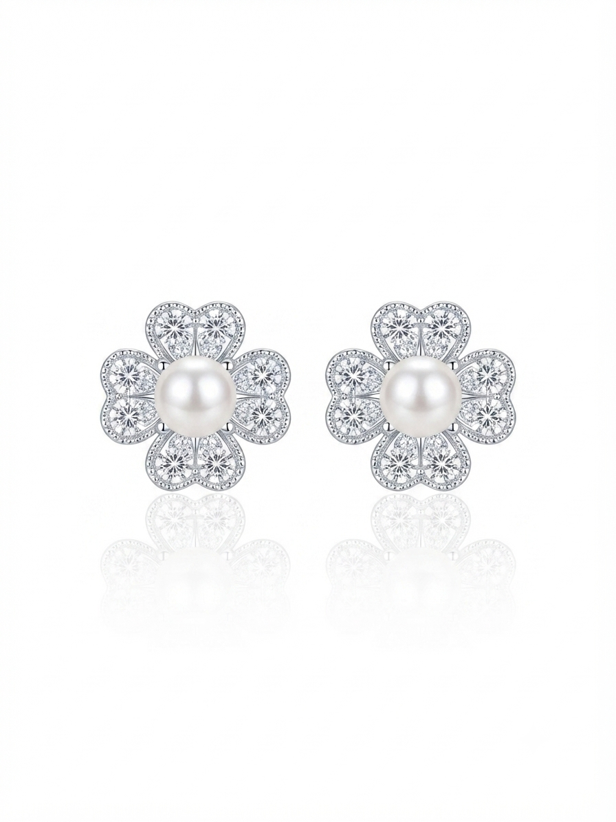 Earrings set with zircon stones and pearls