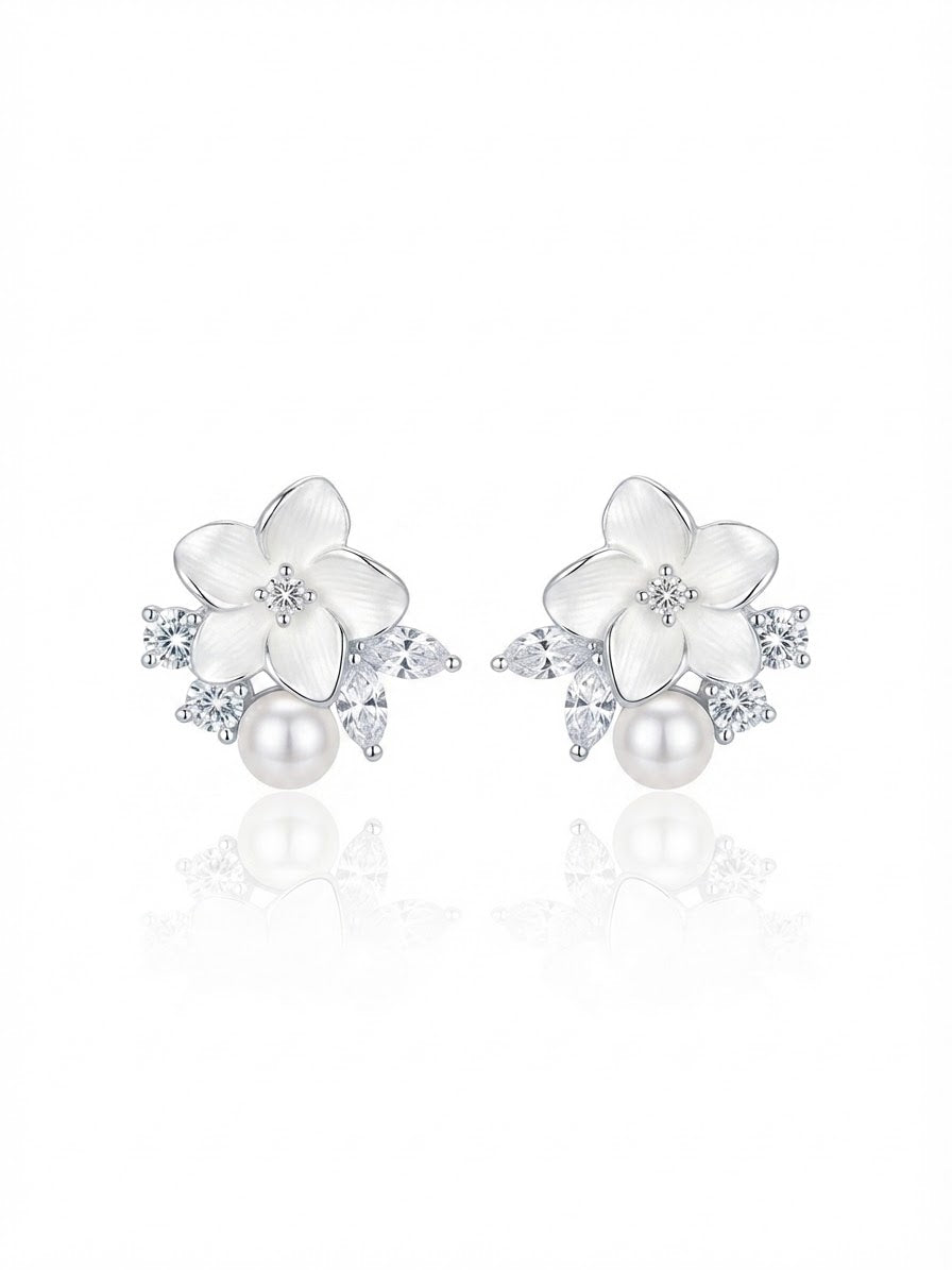 Earrings set with zircon stones and pearls