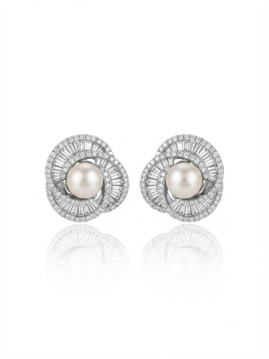 Earrings set with zircon stones and pearls