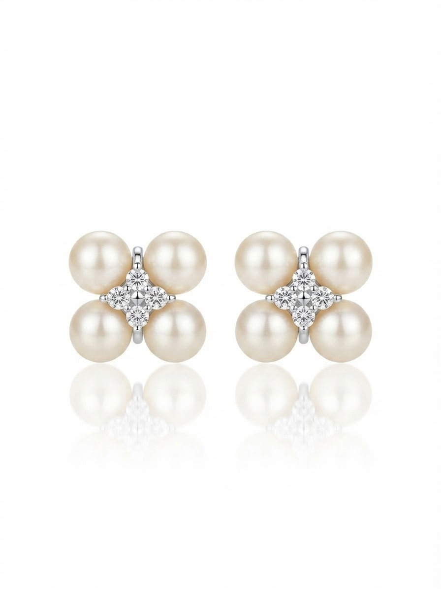 Earrings set with zircon stones and pearls