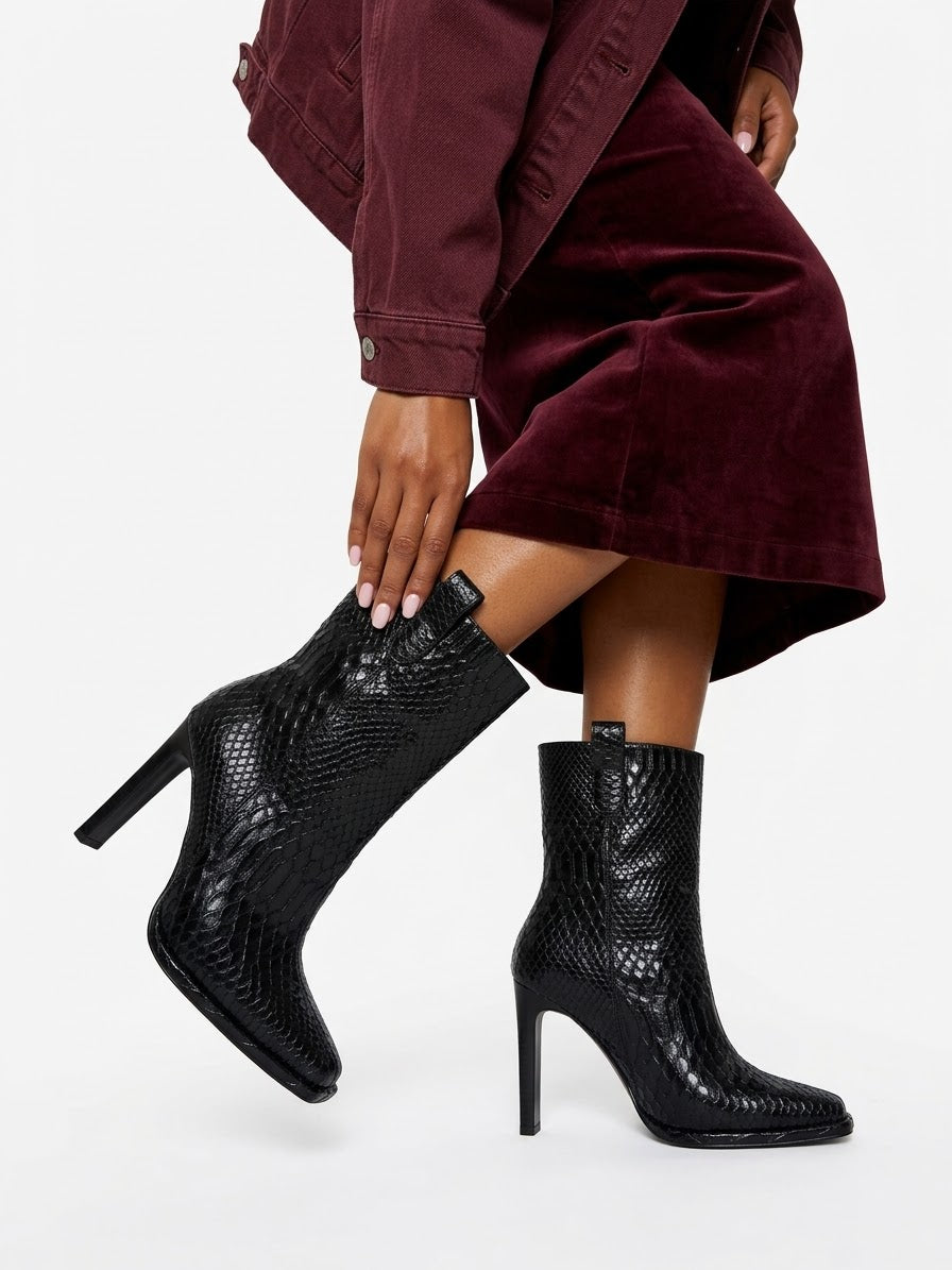 Long black leather boots