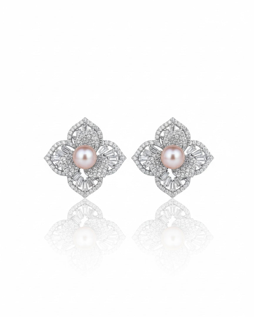 أقراط مرصعة بالزركون واللؤلؤ