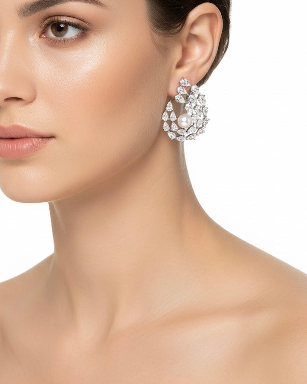 أقراط مرصعة بالزركون واللؤلؤ