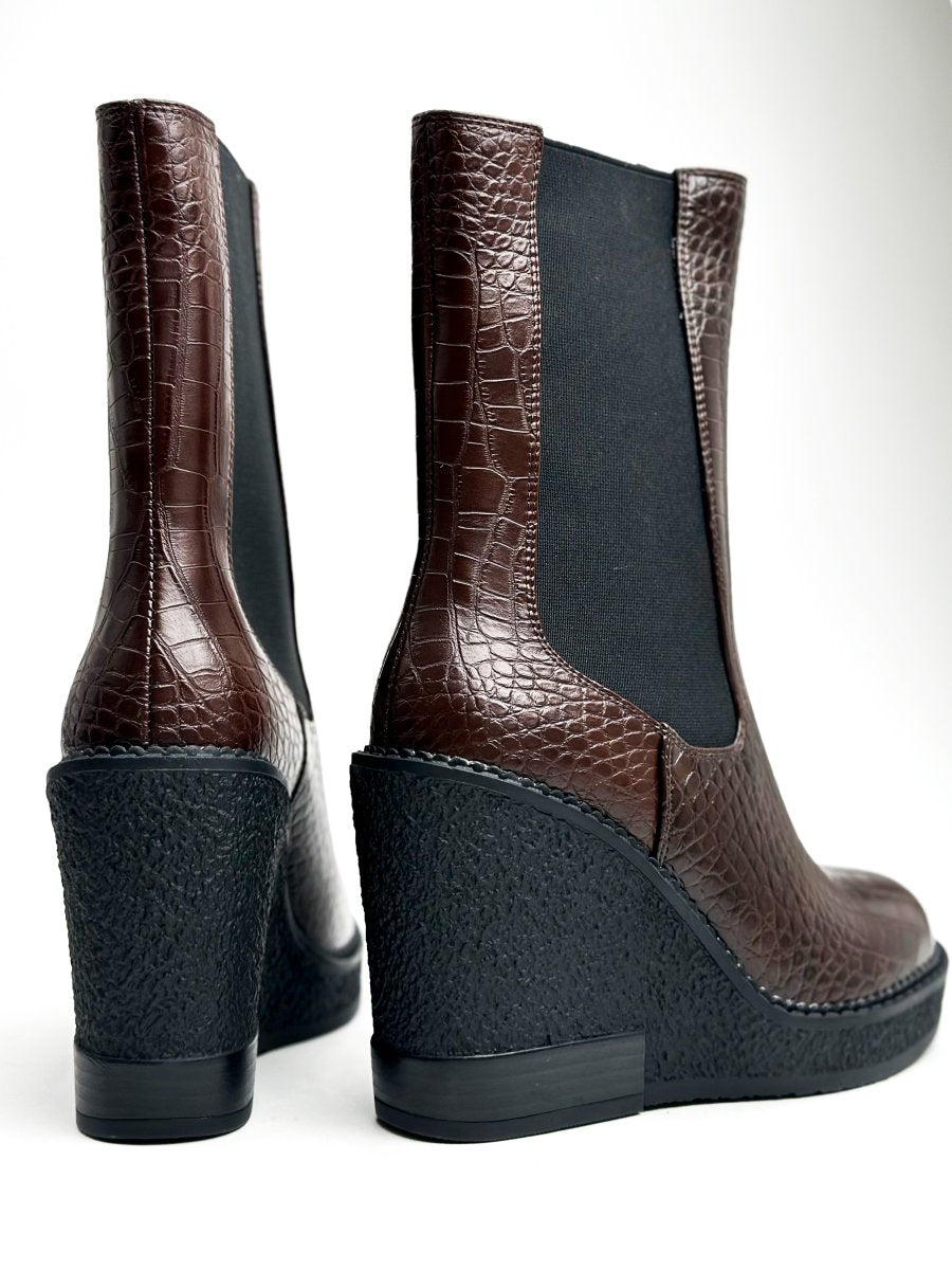 Mid-calf glossy leather boots