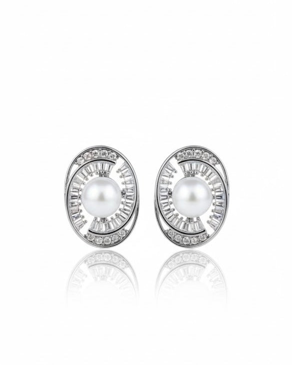 أقراط مرصعة بالزركون واللؤلؤ