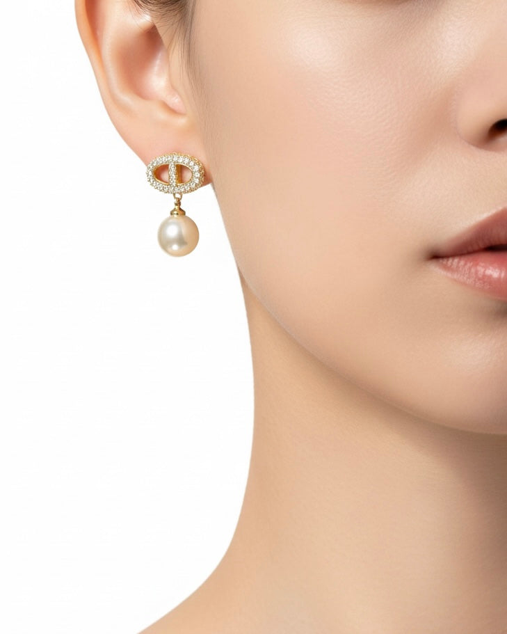 أقراط مرصعة بالزركون واللؤلؤ