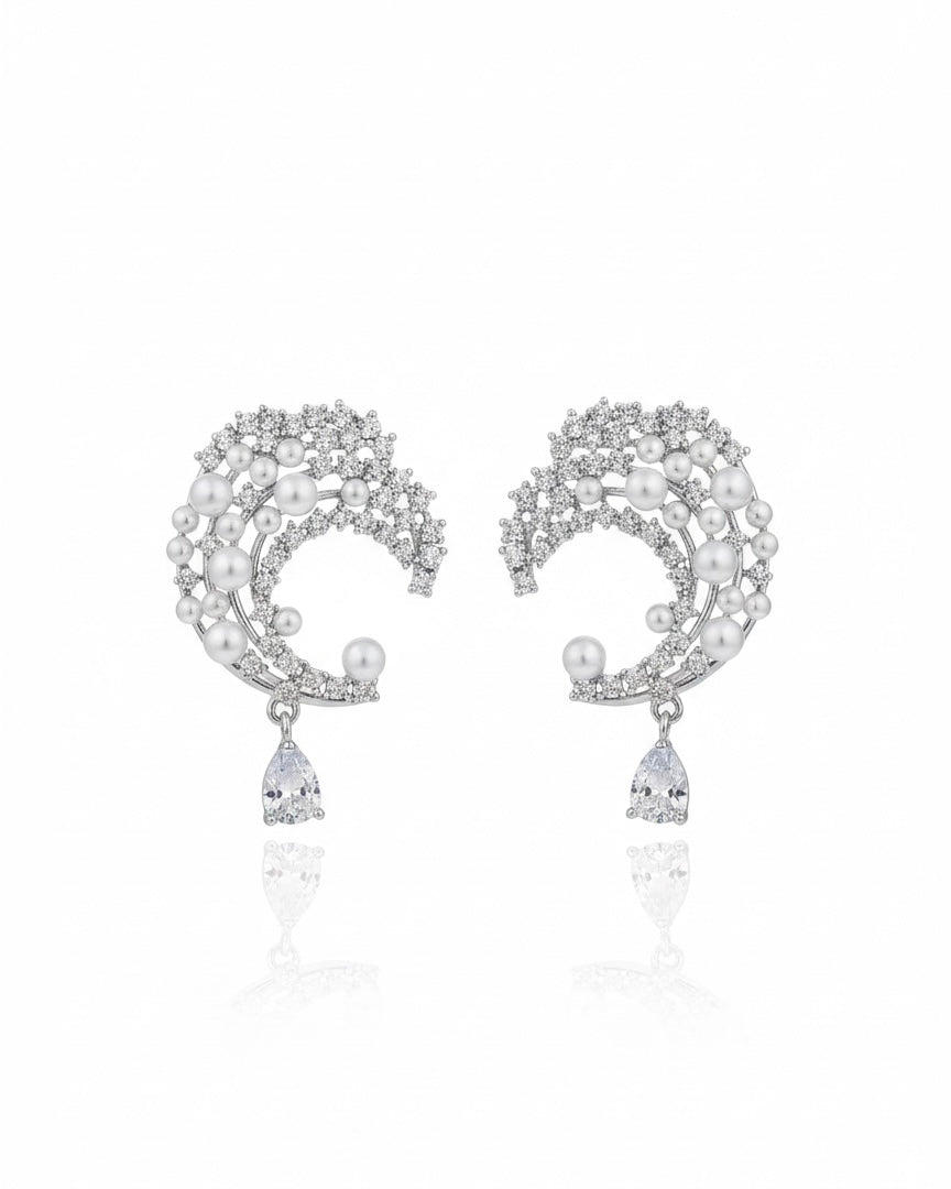 أقراط مرصعة بالزركون واللؤلؤ