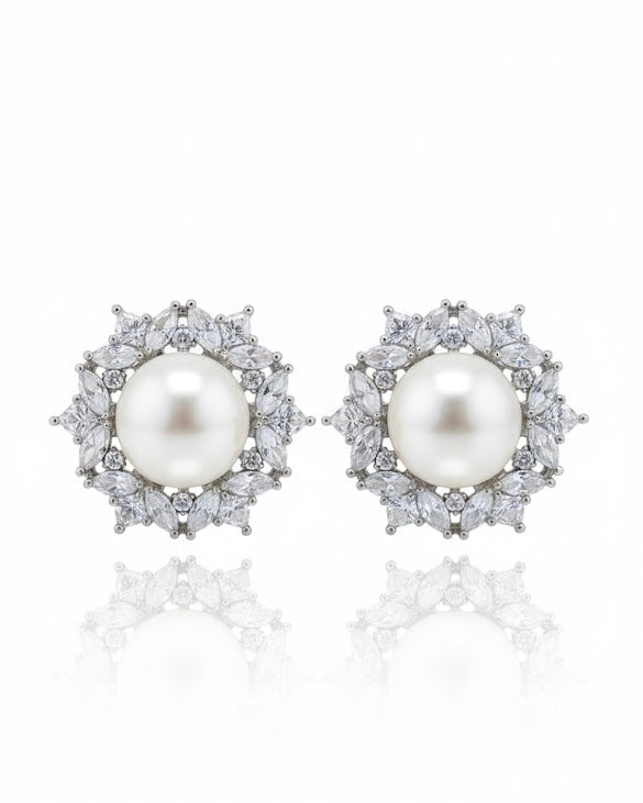 أقراط مرصعة بالزركون واللؤلؤ