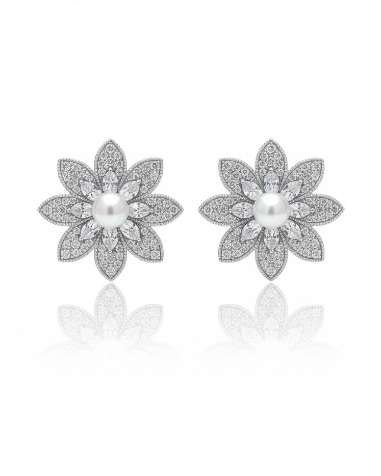 أقراط مرصعة بالزركون واللؤلؤ