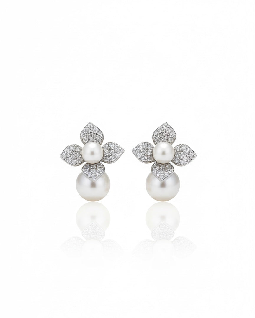 أقراط مرصعة بالزركون واللؤلؤ