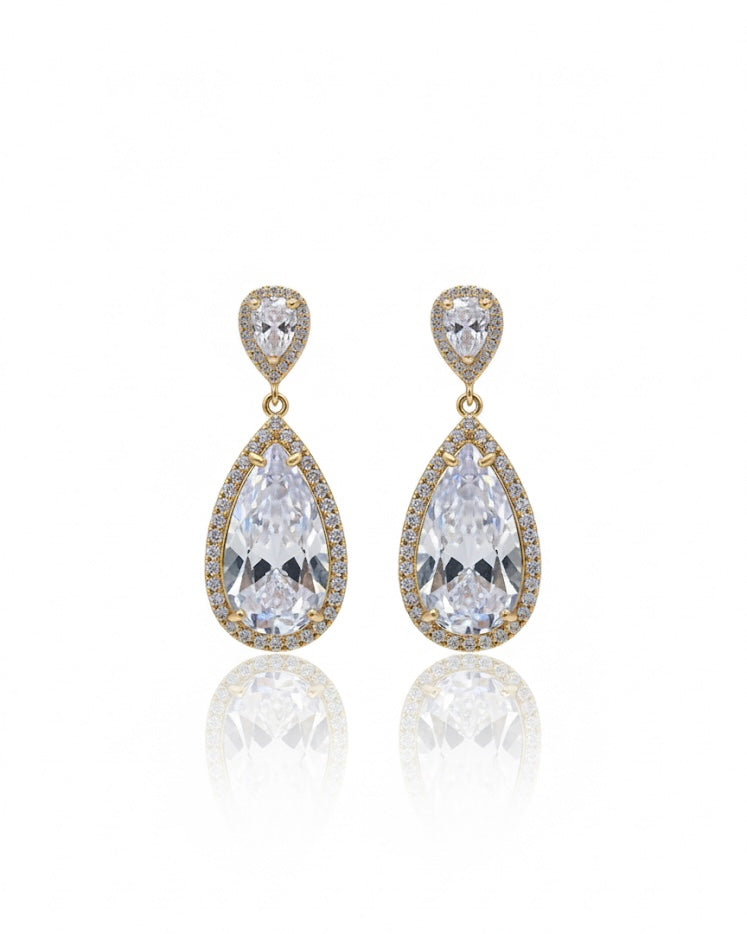 أقراط مرصعة بالزركون والكريستال