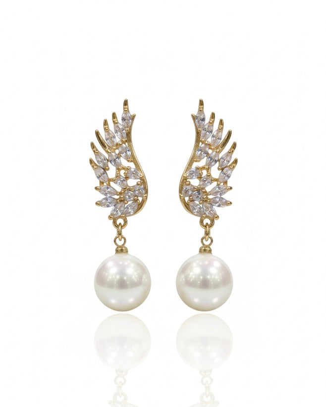 أقراط مرصعة بالزركون واللؤلؤ