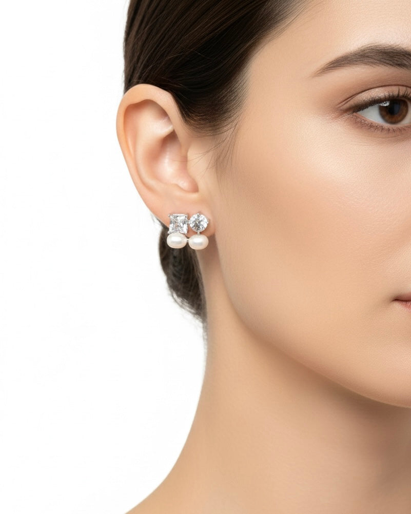 أقراط مرصعة بالزركون واللؤلؤ