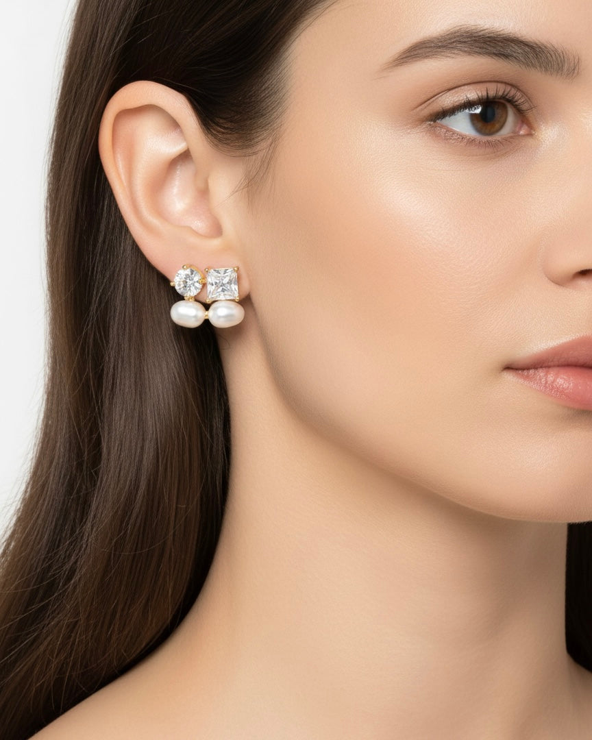 أقراط مرصعة بالزركون واللؤلؤ