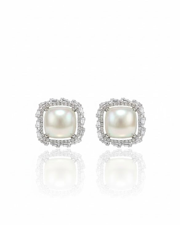 أقراط مرصعة بالزركون واللؤلؤ