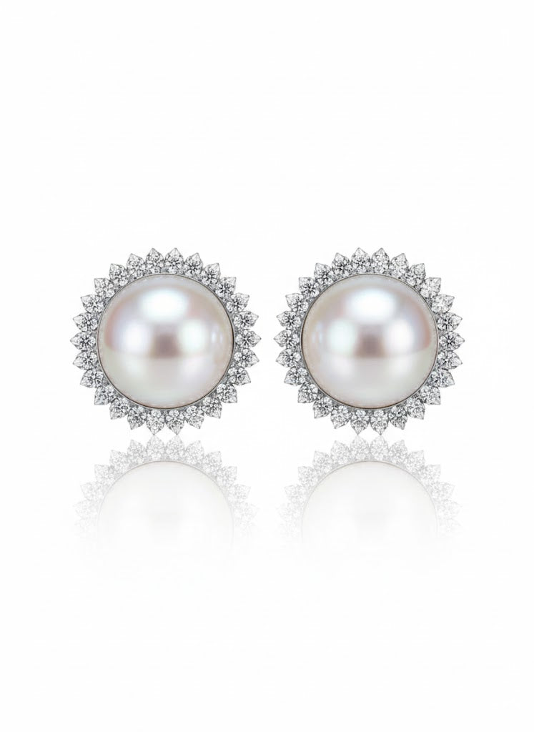 أقراط مرصعة بالزركون واللؤلؤ