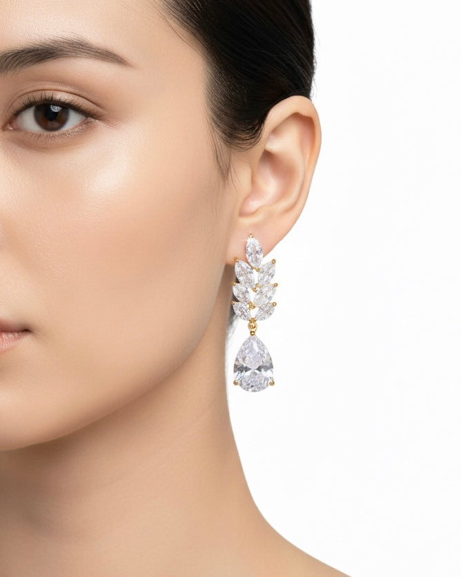 أقراط مرصعة بالزركون والكريستال