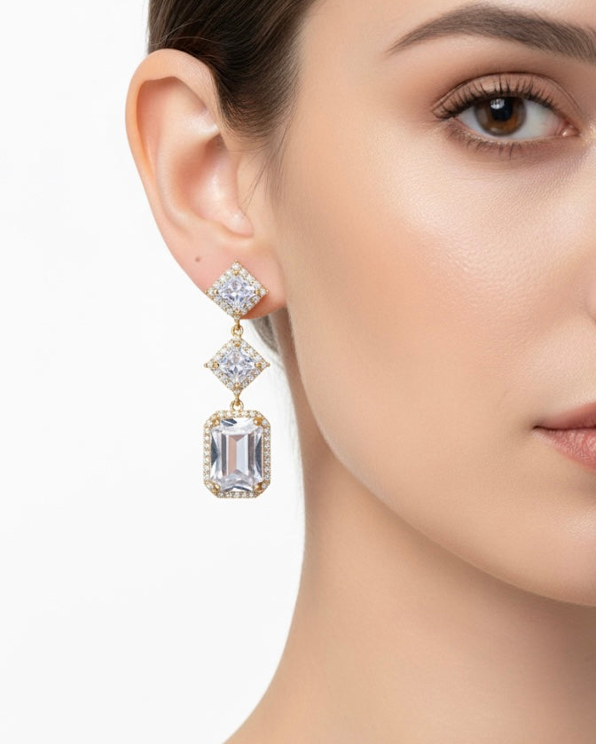 أقراط مرصعة بالزركون والكريستال