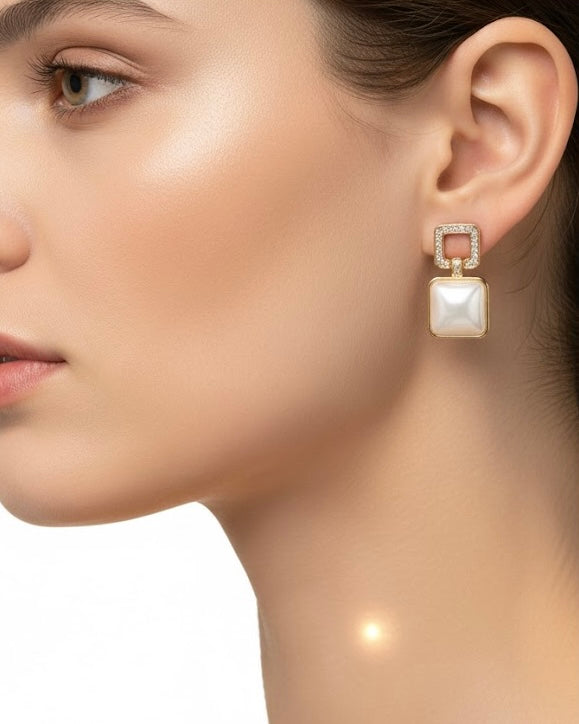 أقراط مرصعة بالزركون واللؤلؤ