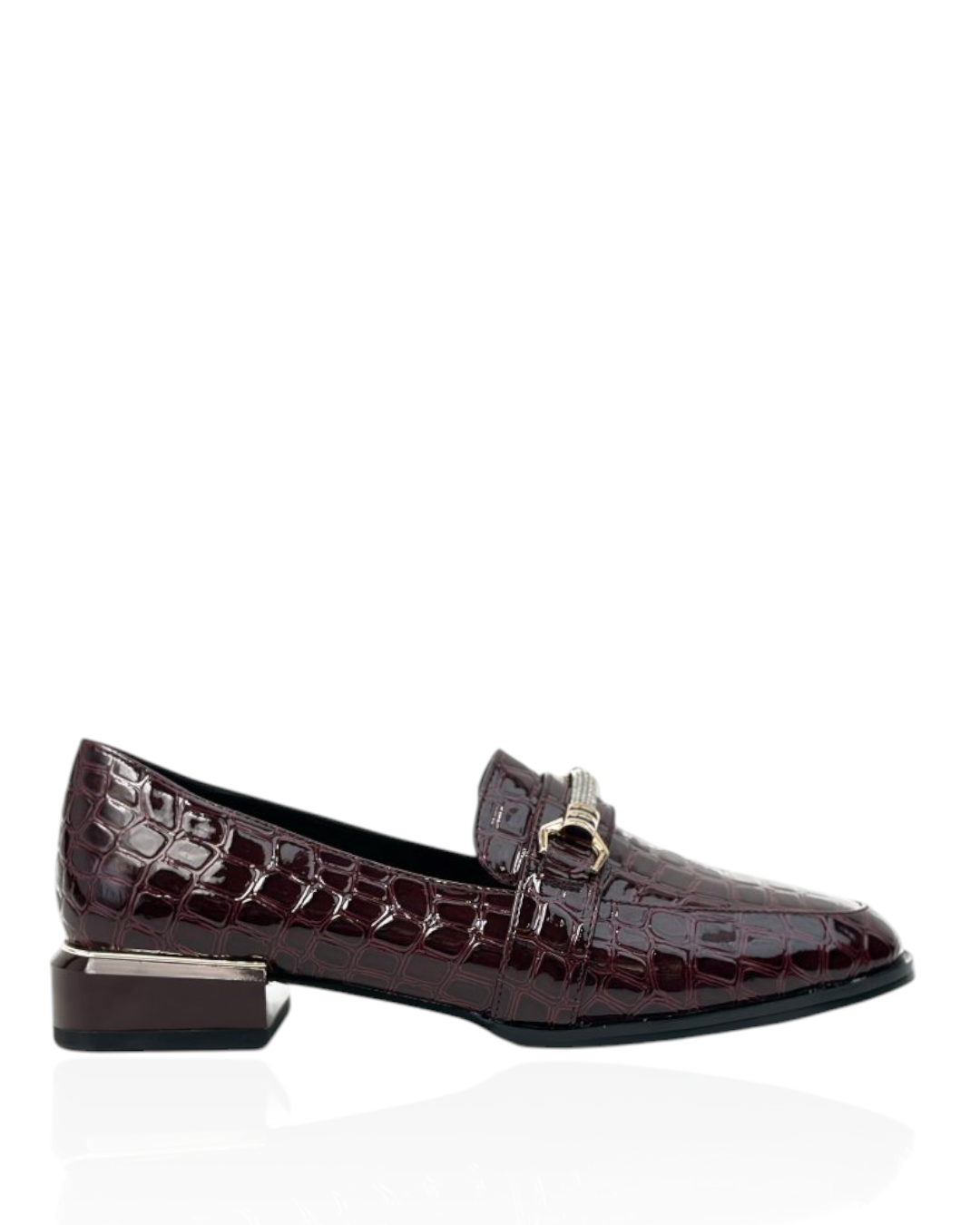 Orthopedic loafers with a crocodile pattern