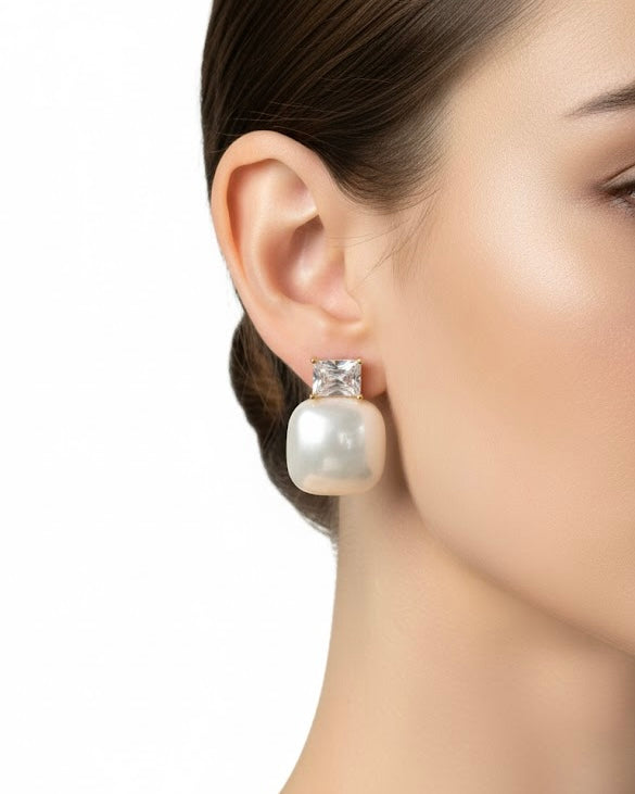 أقراط مرصعة بالزركون واللؤلؤ