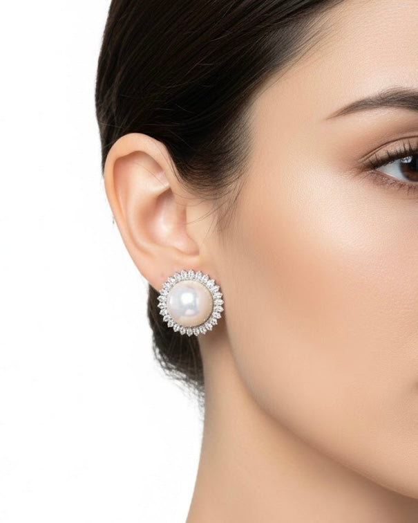 أقراط مرصعة بالزركون واللؤلؤ