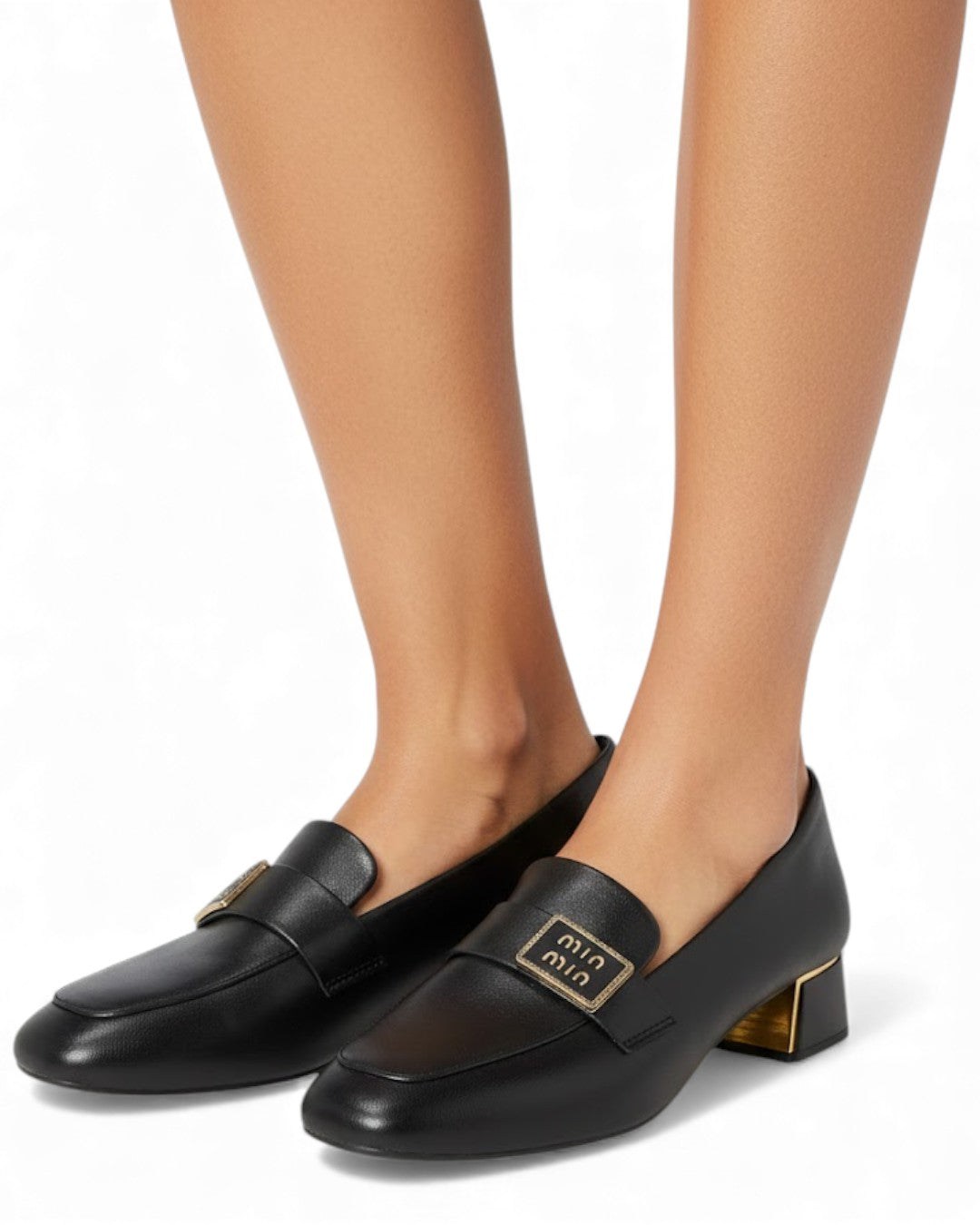 Classic loafers with a gold accent