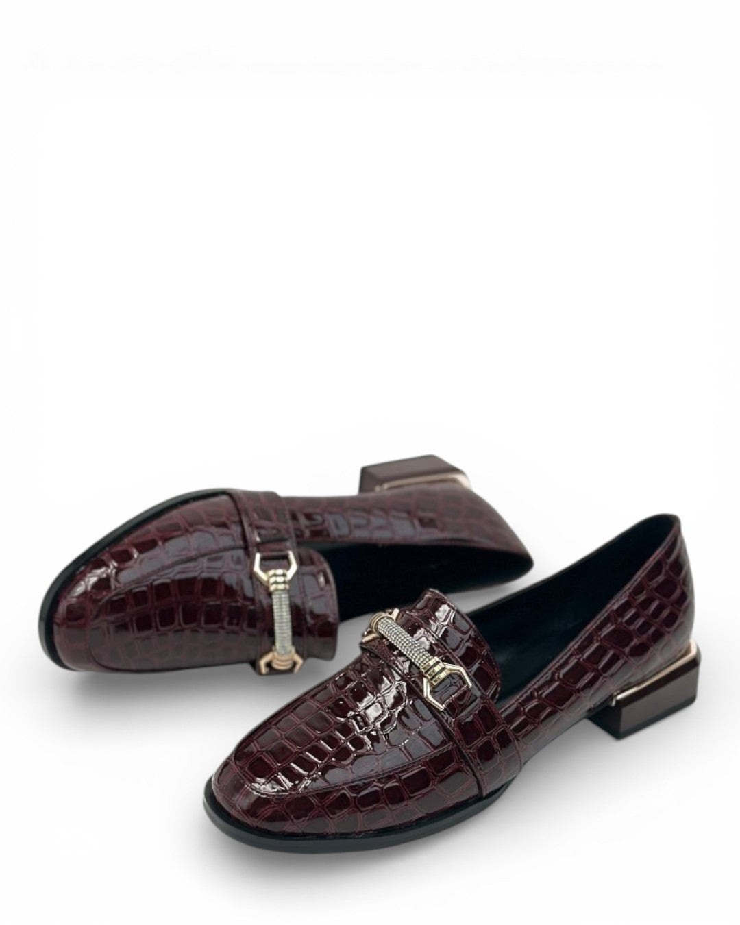 Orthopedic loafers with a crocodile pattern